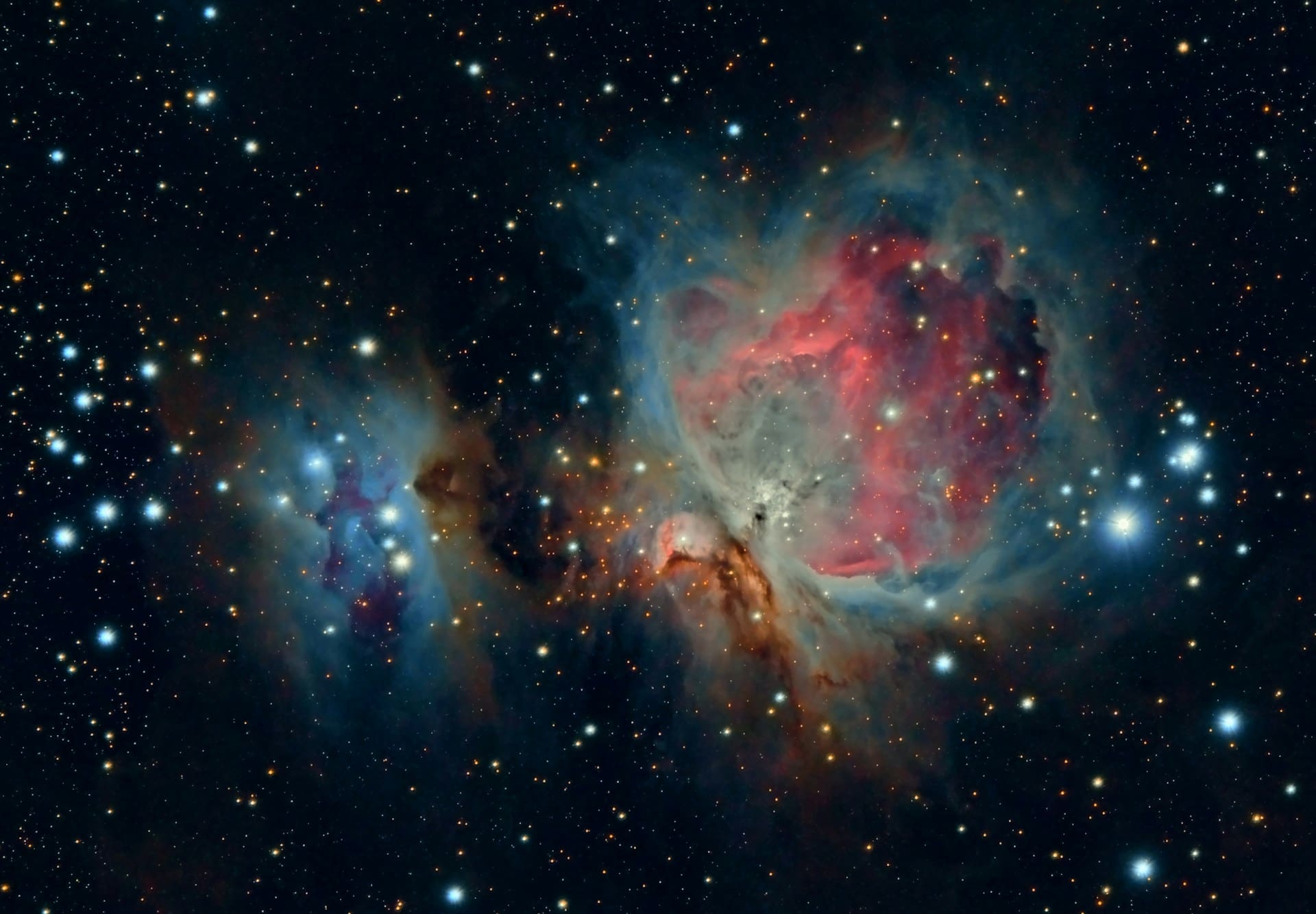 a colorful galaxy with multiple galaxies around it