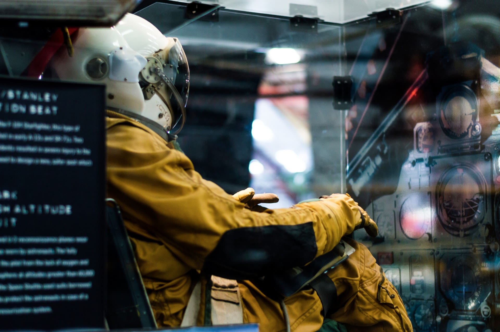 Man inside an spacecraft in a suit and helmet